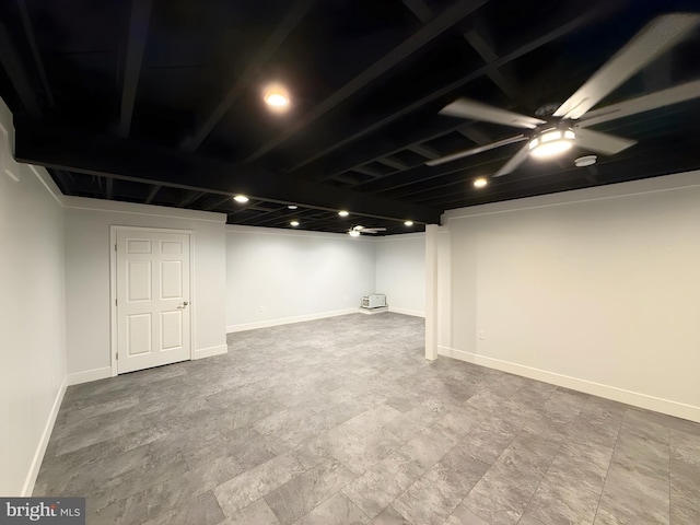 basement with ceiling fan