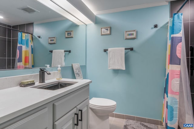 bathroom featuring tile patterned flooring, ornamental molding, vanity, toilet, and a shower with curtain