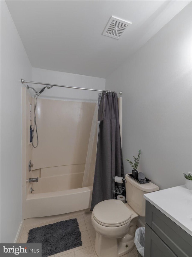 full bathroom with shower / tub combo with curtain, vanity, toilet, and tile patterned floors