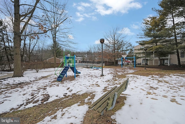 view of snow covered playground