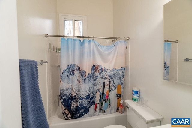 bathroom featuring shower / bath combo and toilet