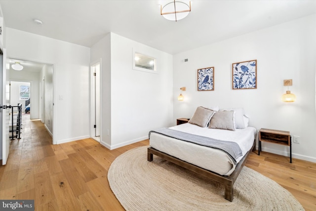 bedroom featuring light hardwood / wood-style flooring