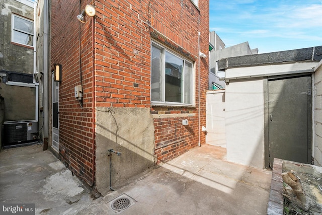 view of side of property featuring cooling unit