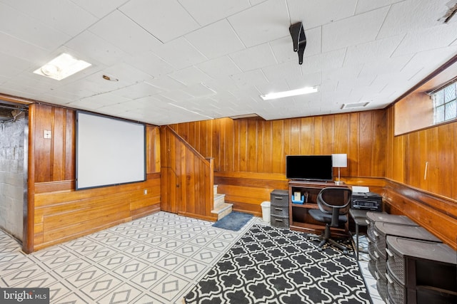 office area featuring wooden walls