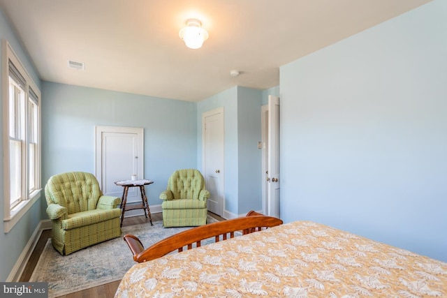 bedroom featuring hardwood / wood-style floors