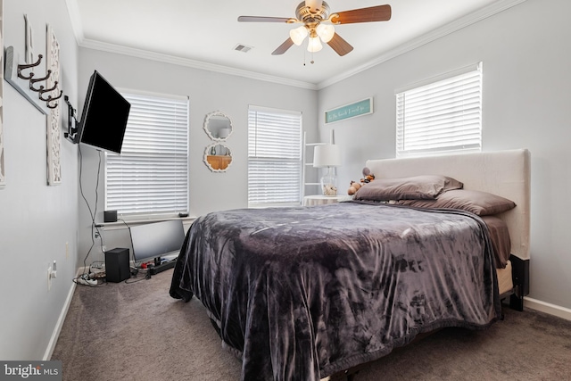 carpeted bedroom with baseboards, visible vents, ceiling fan, and crown molding