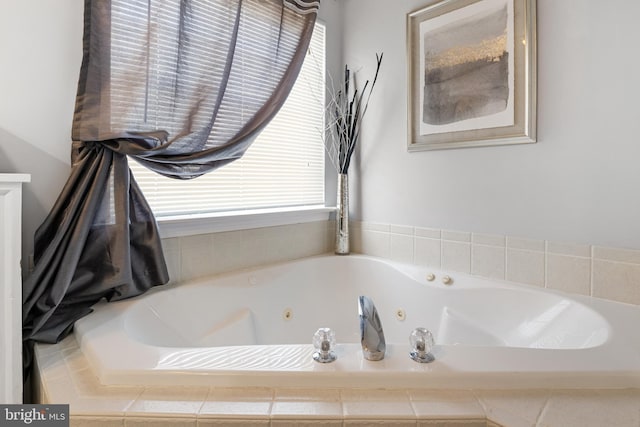 bathroom with a whirlpool tub