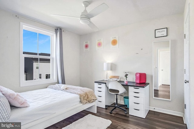 bedroom featuring dark hardwood / wood-style flooring and ceiling fan