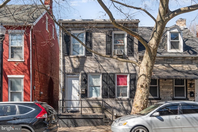 view of front facade featuring stone siding