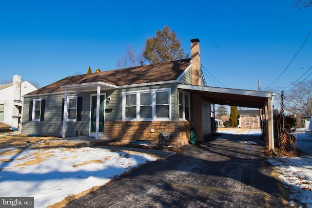 view of front of house with a carport