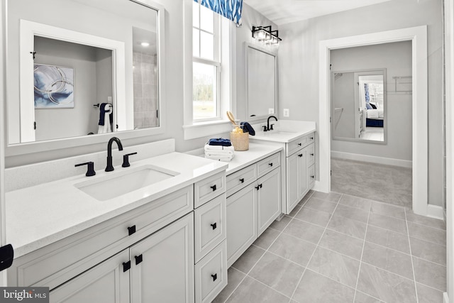 bathroom featuring vanity and tile patterned flooring