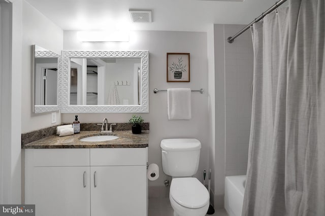 full bathroom featuring vanity, shower / bathtub combination with curtain, and toilet