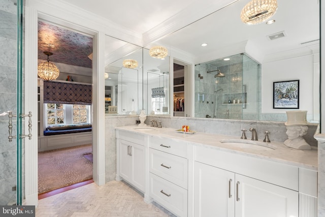 bathroom with vanity, parquet floors, crown molding, and backsplash