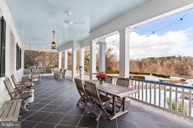 view of patio / terrace featuring ceiling fan and covered porch