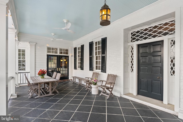 view of patio with french doors and ceiling fan