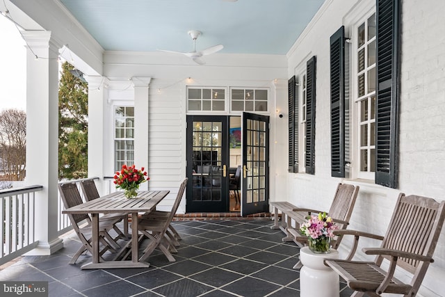 view of patio featuring ceiling fan