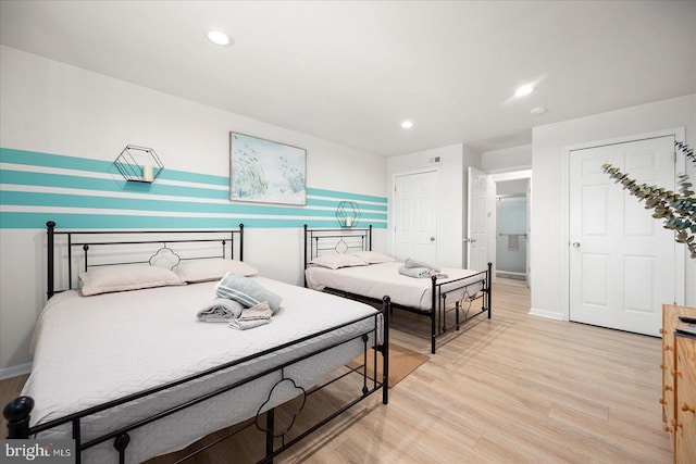 bedroom featuring light hardwood / wood-style flooring