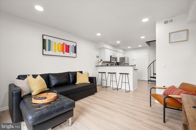 living room with light wood-type flooring