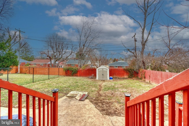 view of yard featuring a patio area and a shed