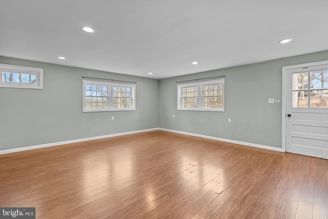 interior space with hardwood / wood-style flooring and a wealth of natural light