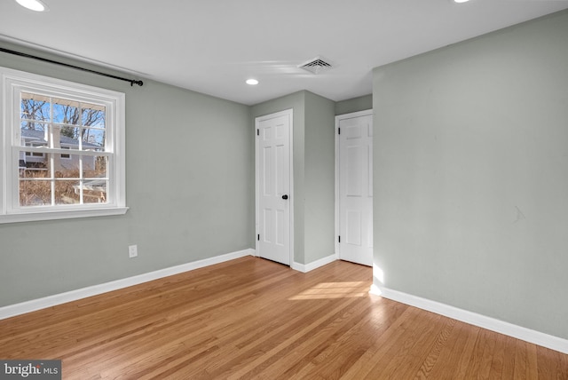 unfurnished bedroom featuring light hardwood / wood-style flooring