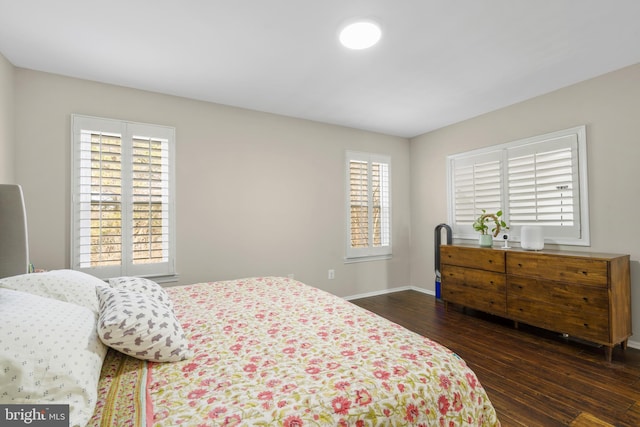 bedroom featuring dark wood-type flooring