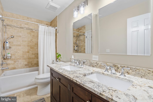 full bathroom with vanity, tile patterned floors, toilet, and shower / bath combo with shower curtain