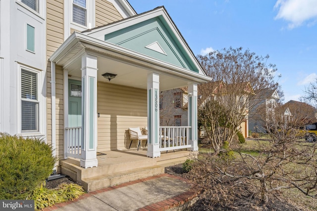 entrance to property with a porch