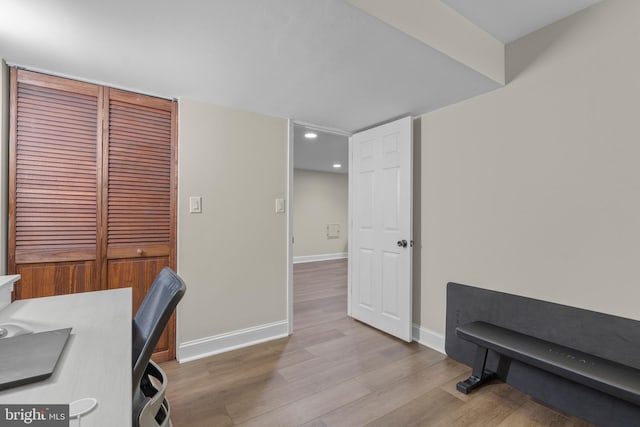 home office featuring light hardwood / wood-style floors