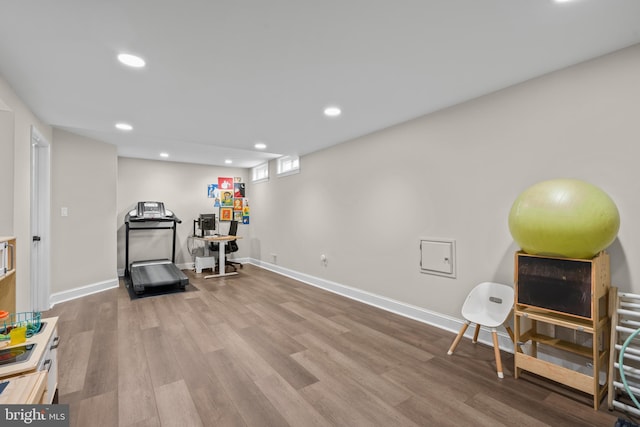 exercise area featuring hardwood / wood-style floors