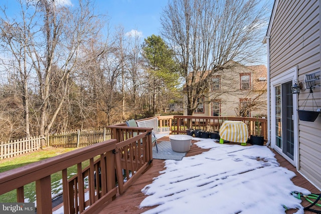 view of snow covered deck