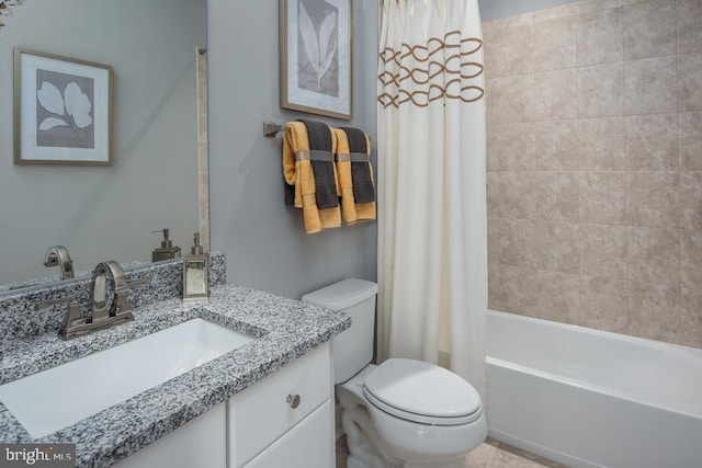 full bathroom featuring vanity, shower / tub combo with curtain, and toilet