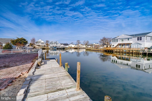 dock area featuring a water view