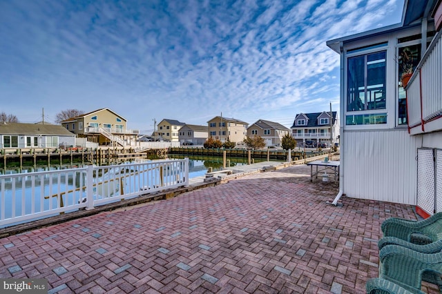 view of patio / terrace with a water view