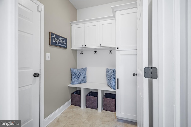 mudroom featuring light tile patterned floors