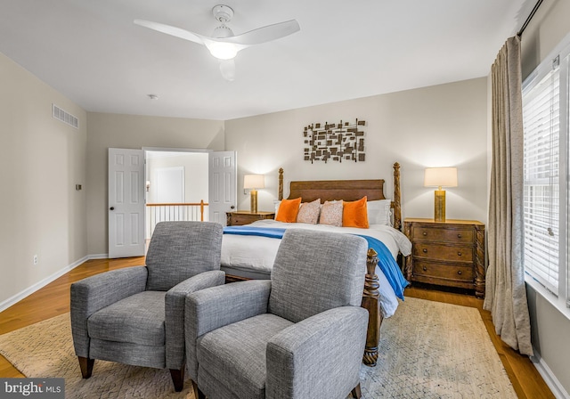 bedroom featuring ceiling fan and light wood-type flooring