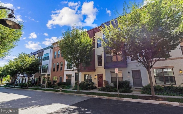 view of building exterior with a residential view