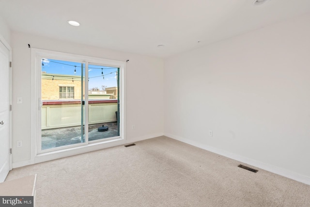 empty room featuring carpet floors