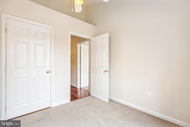 unfurnished bedroom with light carpet