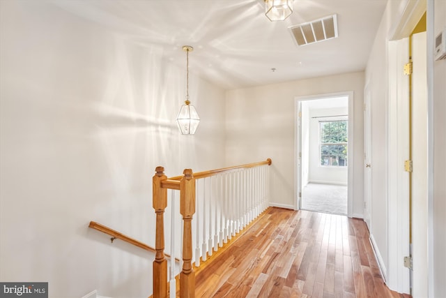 hallway featuring hardwood / wood-style floors