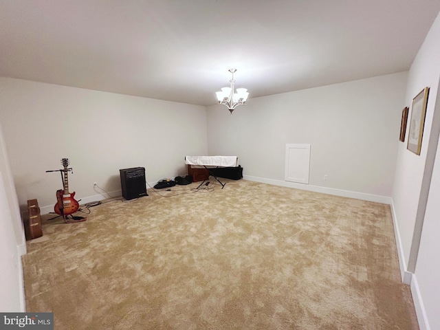 misc room with carpet floors and a notable chandelier