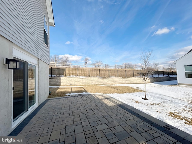 view of snow covered patio