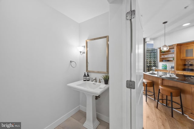 bathroom featuring hardwood / wood-style flooring