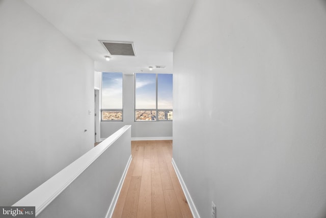 hallway featuring light wood-type flooring