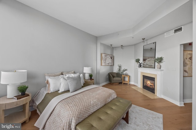 bedroom featuring wood-type flooring