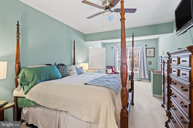 bedroom with ceiling fan and light colored carpet