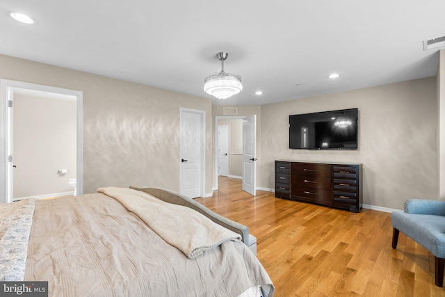 bedroom featuring light wood-type flooring