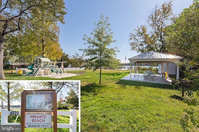 view of yard with fence, playground community, and a gazebo