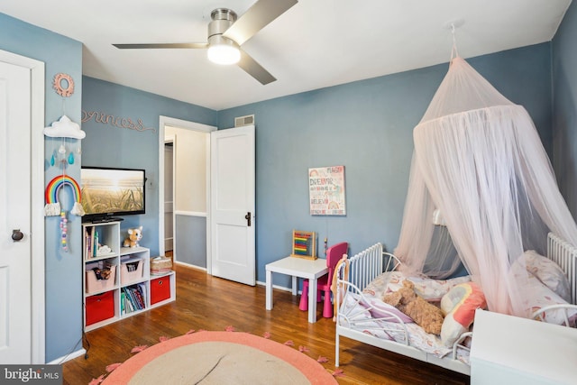 rec room with dark wood-type flooring and ceiling fan