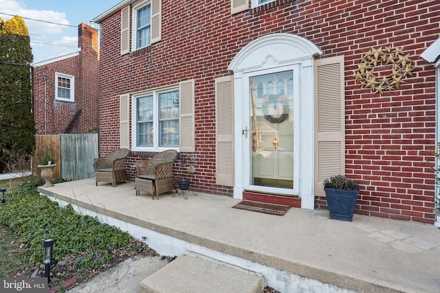 property entrance with a patio